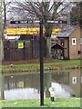 SK4547 : Direction signpost at Langley Mill Basin by Graham Hogg