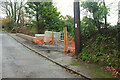 Wall replaces bank, Old Teignmouth Road, Dawlish