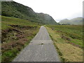 NC4549 : Strath More - Minor road beneath the flank of Creag na Garbh-baid by Peter Wood