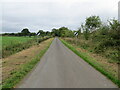 Minor road leaving Kirkandrews Moat near to Riddingshill