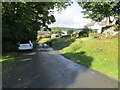 Minor road, track and housing at Woodburn