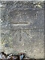 Cut mark, bench mark on western sandstone wall/gatepost good condition
