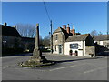 The village pub, with Mediaeval preaching cross, Ashton Keynes