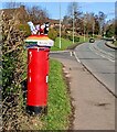 Colourful hat on a pillarbox, Henllys Way, Cwmbran