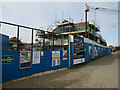 Houses under construction by Brandon Station