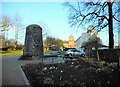 NS5489 : Balfron War Memorial and church by Richard Sutcliffe