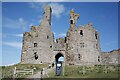 NU2521 : Entrance to Dunstanburgh Castle by Tom Page