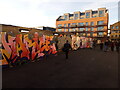 View of street art on the side of a hoarding on Hackney Wick #5