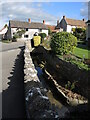 The Nidon Brook in the middle of the village