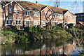 Houses in Archers Court overlooking the River Avon