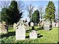 NY5455 : Gravestones in Castle Carrock by Trevor Littlewood