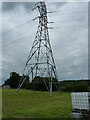 Pylon in a field near Benjay House