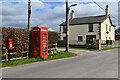 Post box and phone kiosk at Ellwood