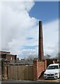 Smoke from the chimney at Norwich Street Mills