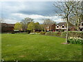 Green space and houses on The Crest