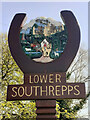 TG2635 : Lower Southrepps village sign repainted by Jane Rackham
