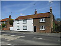 TA0143 : Cottages  on  Main  Street  Leconfield by Martin Dawes