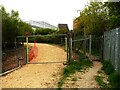 Looking out through the entrance to a playing field, North Bierley