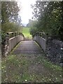 Wooden footbridge over the River Alyn at Loggerheads