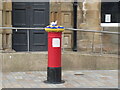 Hat on a pillar box