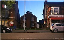 SP8679 : Buildings on Rockingham Road, Kettering by David Howard