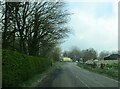 Approaching  road  junction  at  Rock  Moor  Farm