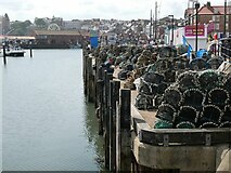 TA0588 : Lobster pots at the Old Harbour by Oliver Dixon