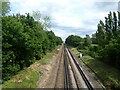 TQ7744 : The railway seen from Clapper Lane by Marathon