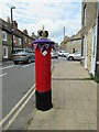 Waterside Ely with pillar box decorated for the Queen
