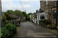 NY9037 : Row of Cottages between Daddry Shield and Westgate by Chris Heaton