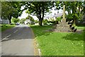 Village cross in Litton