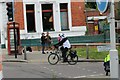 View of a panda in the RideLondon event turning the corner from Broadmead Road into High Road Woodford Green