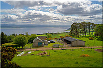 NH7156 : Mount Pleasant Farm above the Moray Firth by Julian Paren