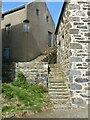 NJ5866 : Staircases and old warehouse, Old Harbour, Portsoy by Alan Murray-Rust
