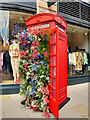 SJ8398 : Manchester Flower Show Jubilee Trail#8 Telephone Kiosk on King Street by David Dixon
