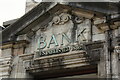 Above the doorway at Lloyds Bank, Bangor