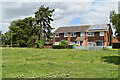 Houses overlooking green at Woodley