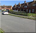 Brick houses and a wooden fence, Frampton on Severn