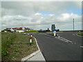 Looking southeast across a new roundabout at Lynton Cross