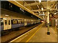 TQ4386 : Elizabeth Line train at Ilford station at night by Stephen Craven