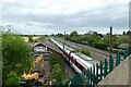 Train passing under Temple Lane