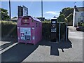 Pay and display machine and clothing bank in the car park