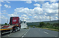 On the A487 heading east, past Morning Star Caravans