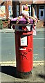 Yarn bombed Victorian postbox on Tennyson Avenue