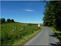 SO1182 : Approaching a cattle grid on the moorland road by Richard Law