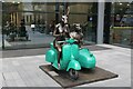 View of the Dogman and Rabbit Girl with Coffee sculpture by Gillie and Marc in Spital Square