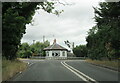 The B4088 north at the Old Toll House, Weethley Gate