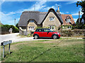 Thatched cottage and Mini, Barrett Lane