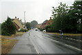 A wet London Road heading east out of Moreton-in-Marsh