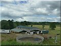 SJ7546 : Barn and circular enclosure by the railway by Stephen Craven